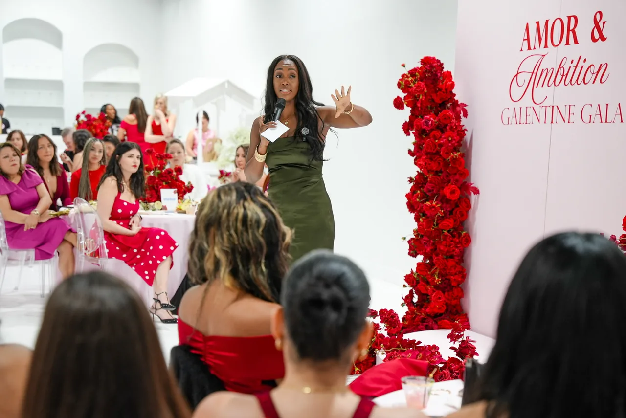 Keleisha Carter speaking at the Amor and Ambition Gala