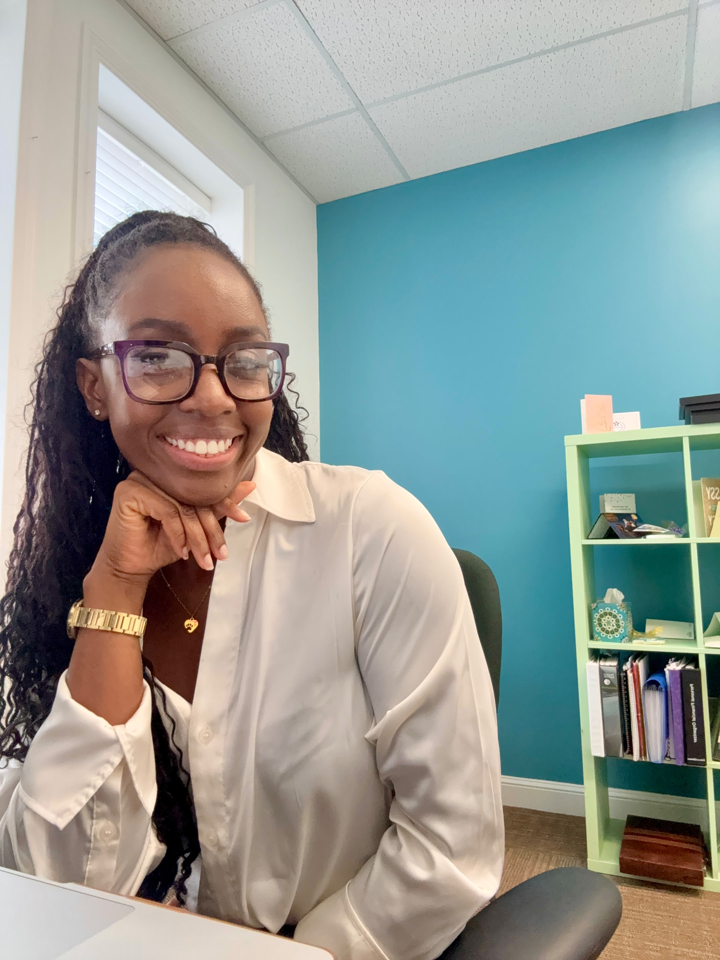 Keleisha Carter working in her office