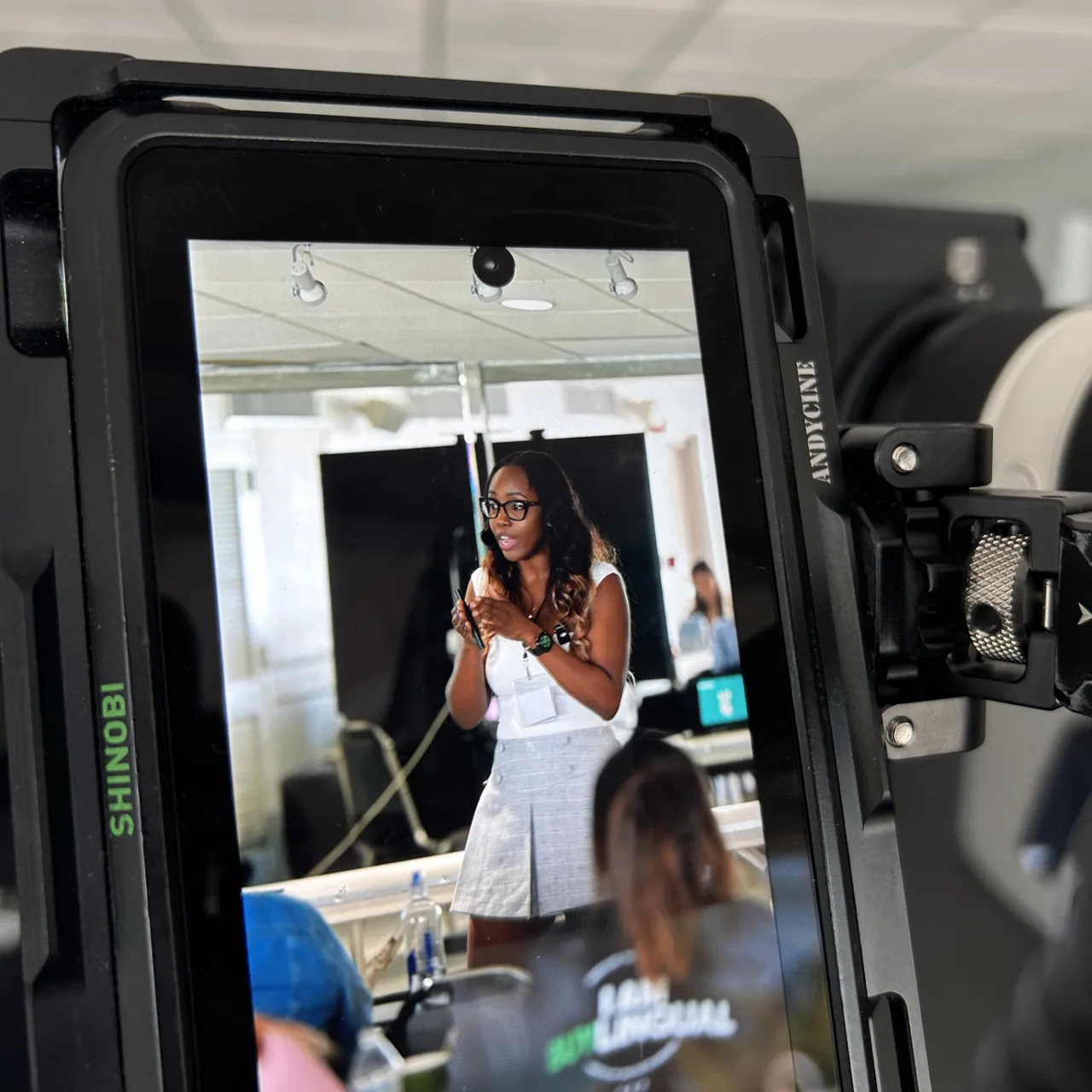 Behind the camera