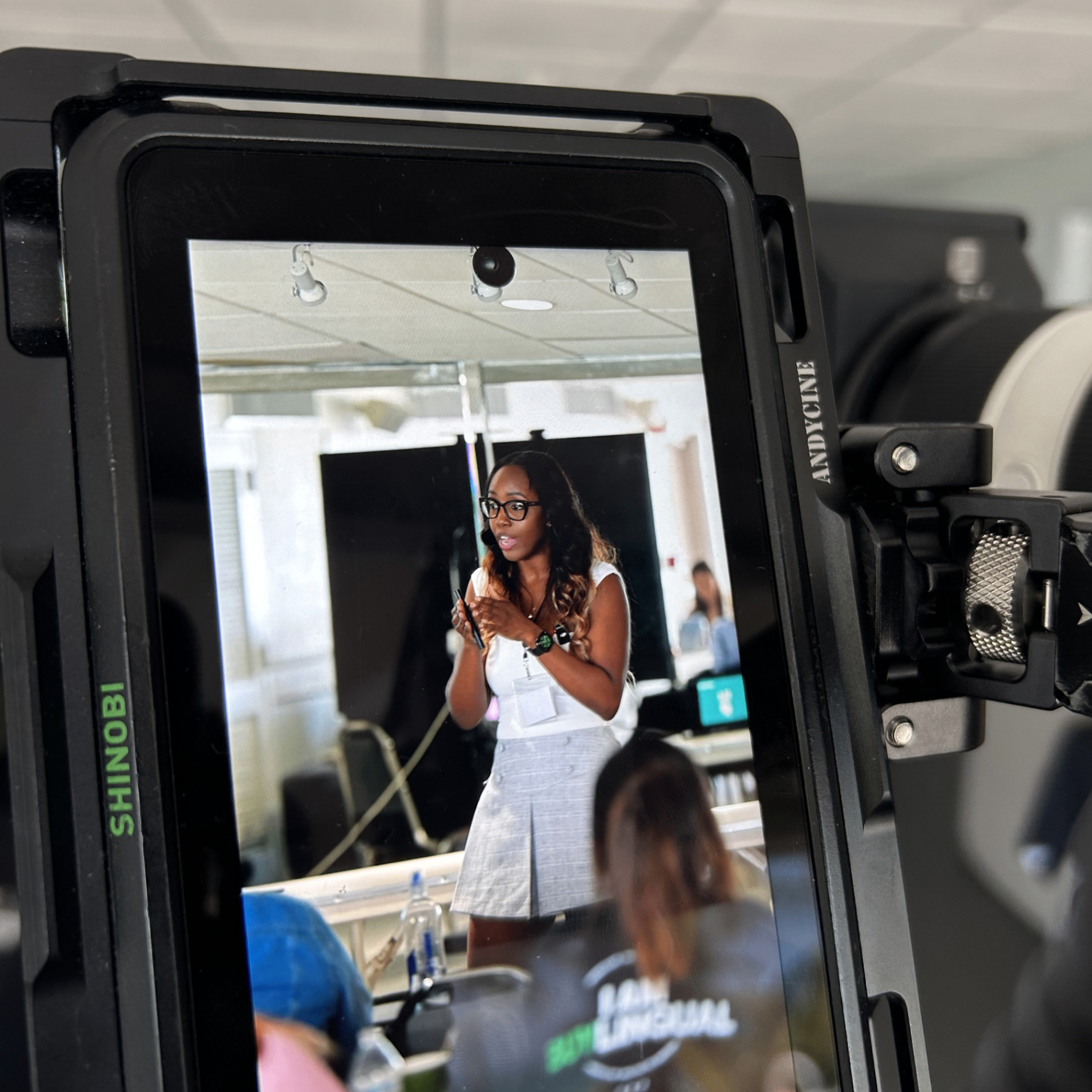 Behind the camera